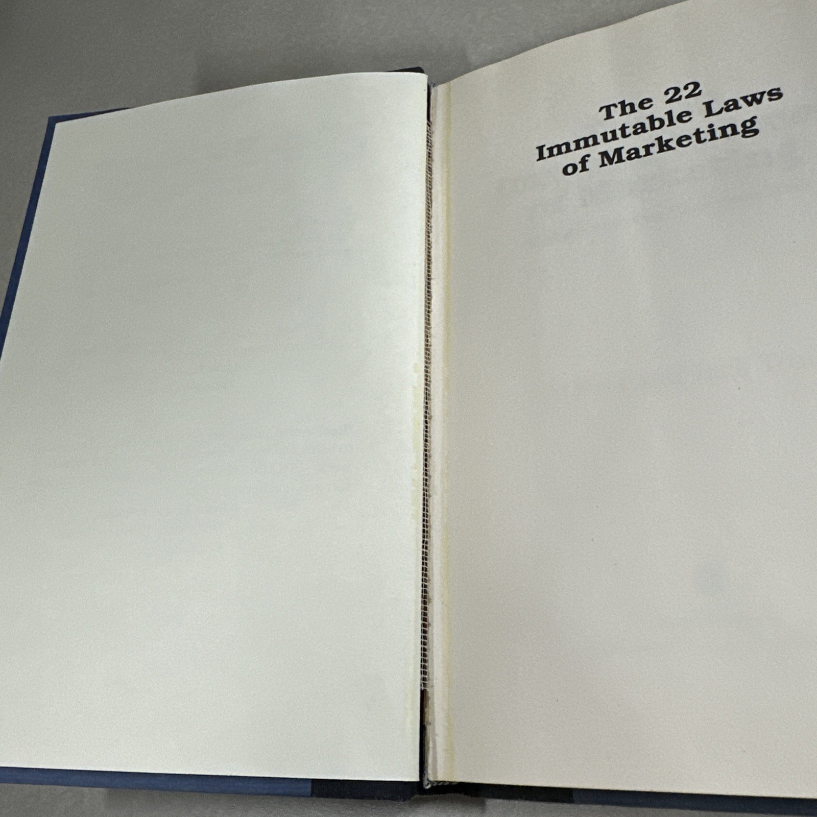 The 22 Immutable Laws Of Marketing – Paperback By Al Ries and Jack Trout – GOOD