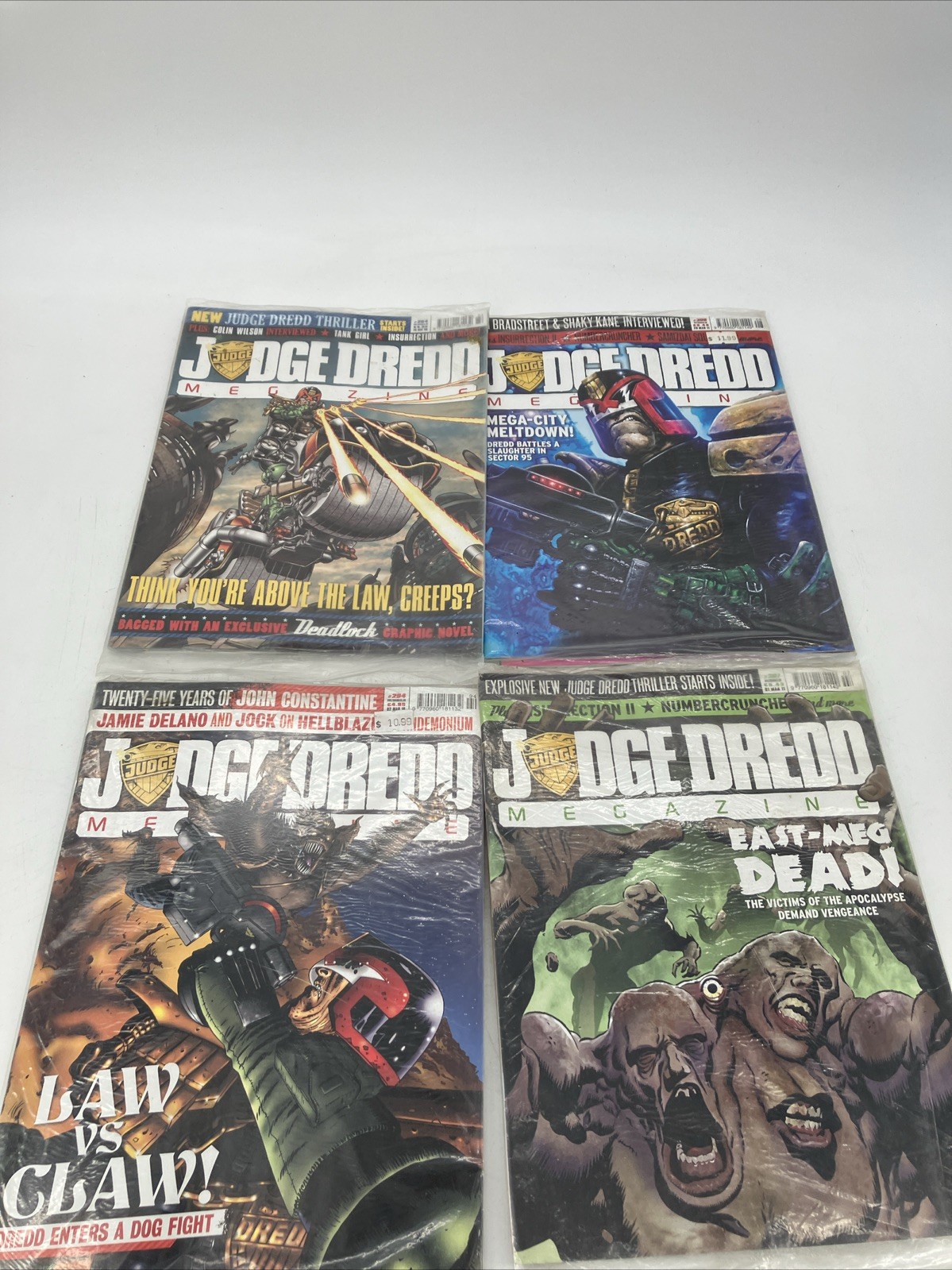 Lot of 4 Judge Dredd Megazine All new and sealed Ships Fast