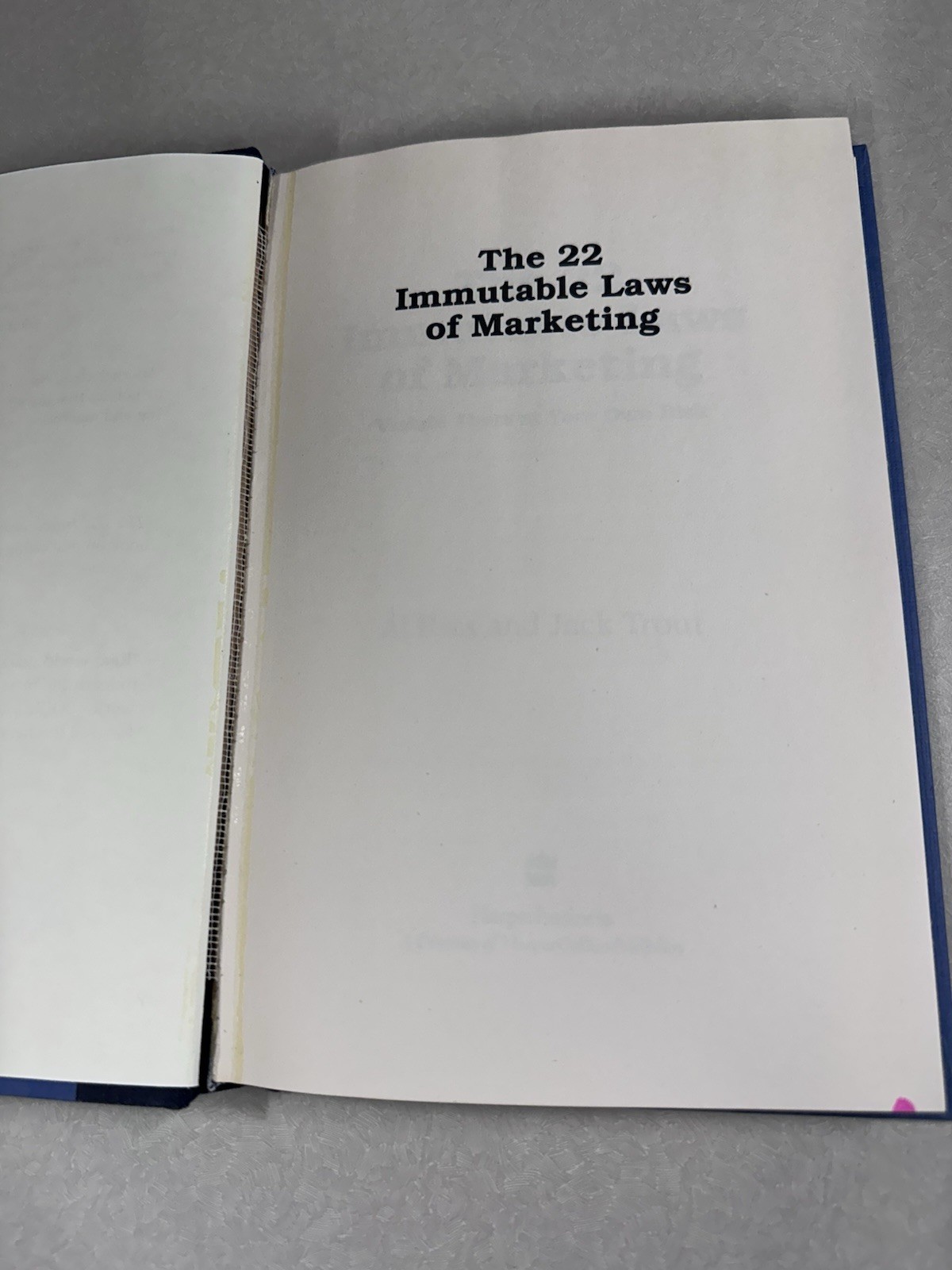 The 22 Immutable Laws Of Marketing – Paperback By Al Ries and Jack Trout – GOOD