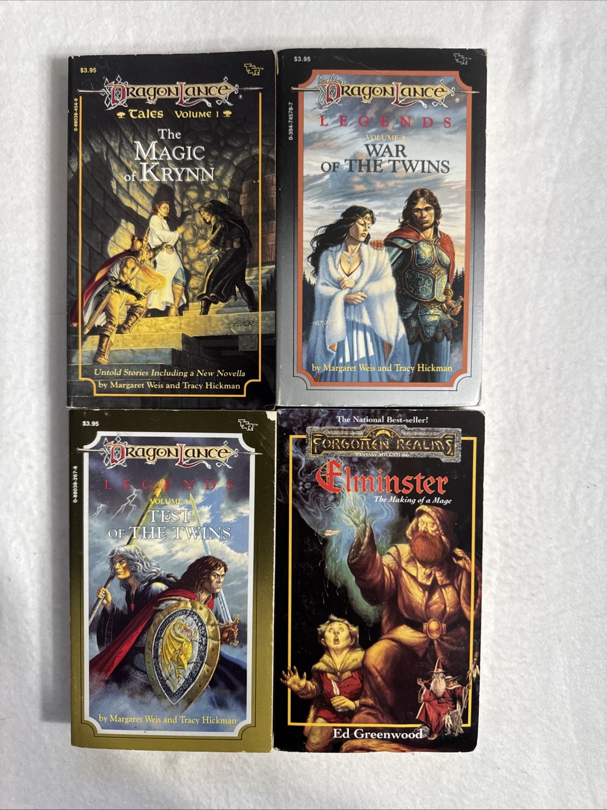 4- 3 Drangonlance and 1 Forgotten Realms by Margaret Weis and Tracy Hickman, Ed