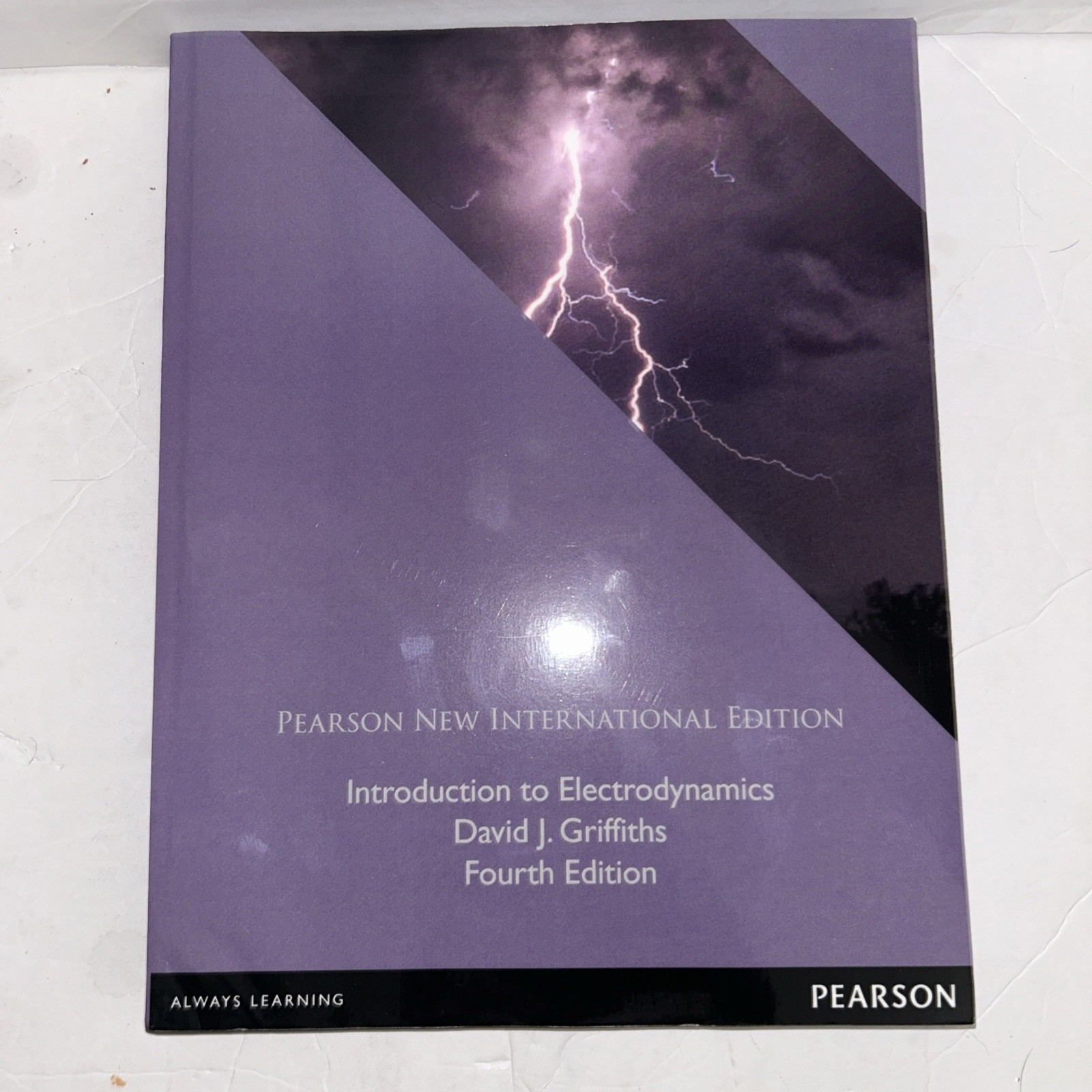 INTRODUCTION TO ELECTRODYNAMICS: PEARSON NEW INTERNATIONAL By David J. Griffiths