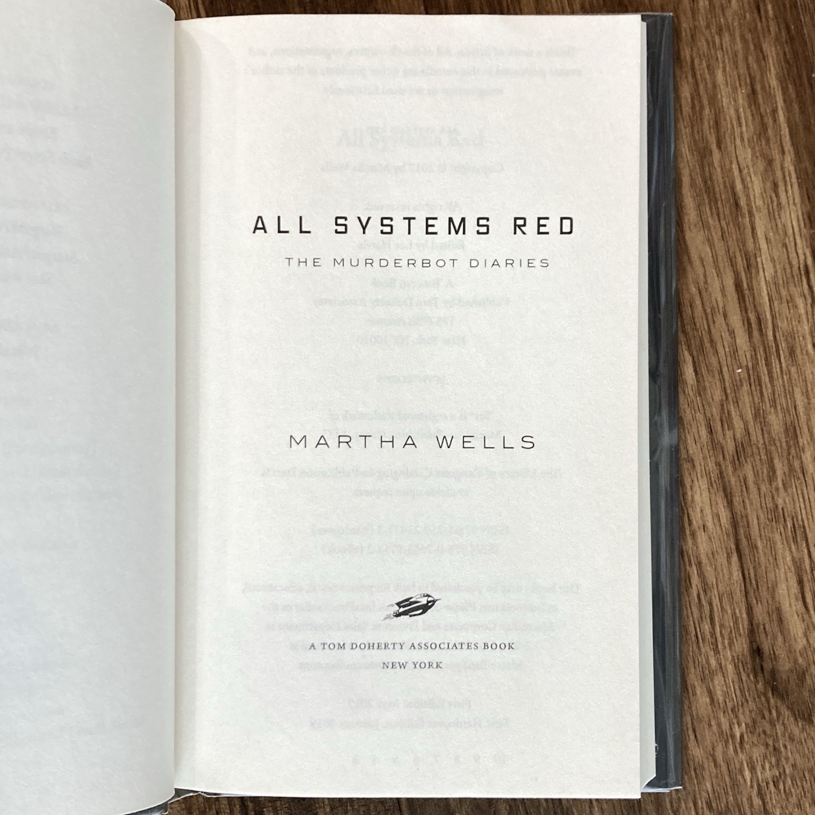 Murderbot: All Systems Red – Martha Wells (1st HC edition 3rd print) Tor, 2019
