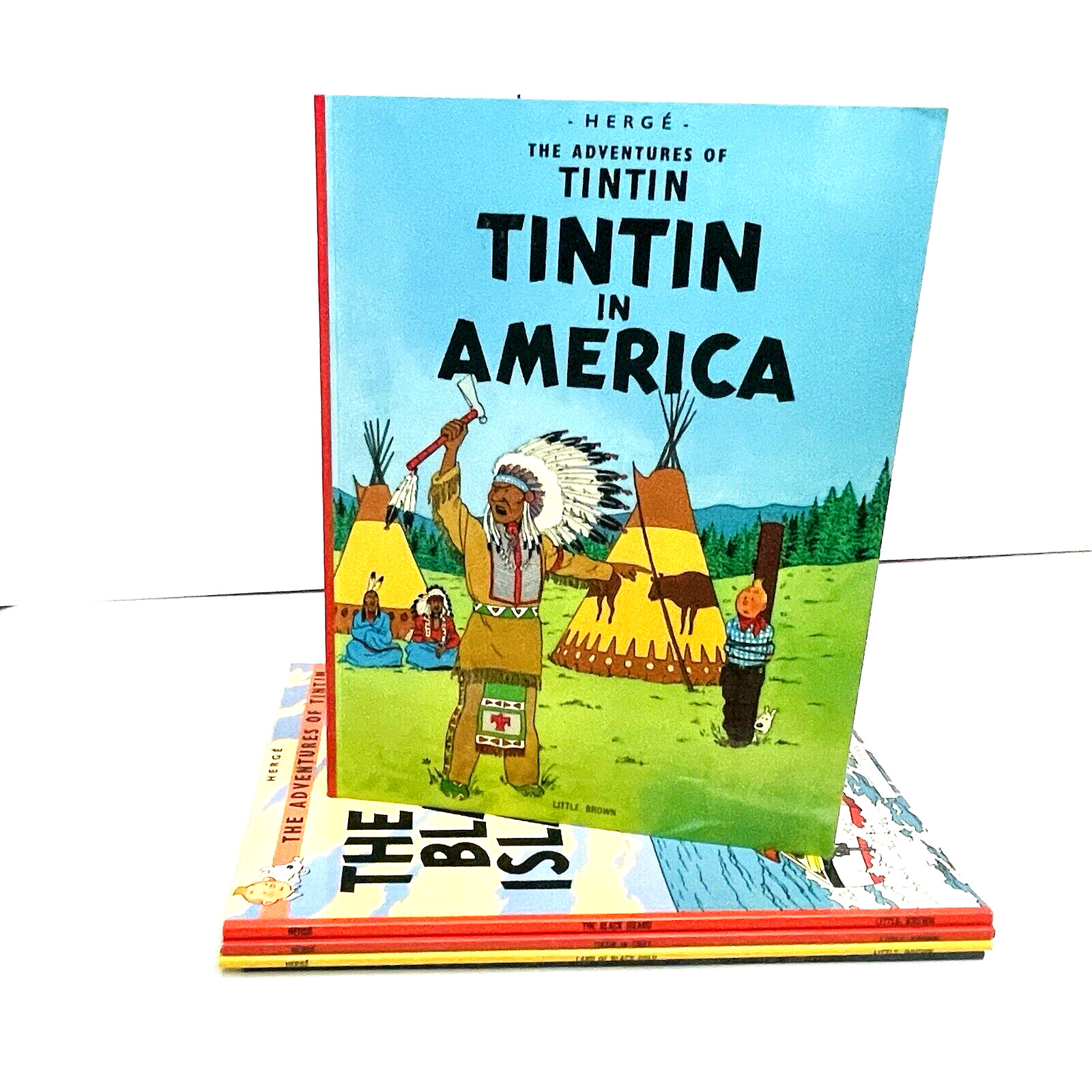 Tintin in America (The Adventures of Tintin) Paperback + 4 more other adventures