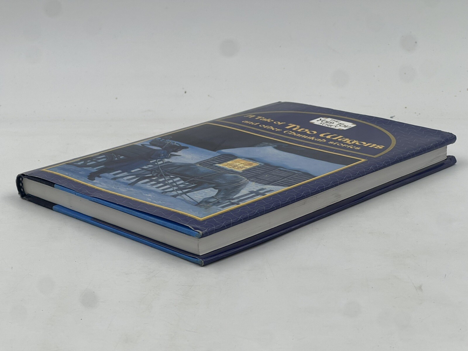 A TALE OF TWO WAGONS & OTHER CHANUKA STORIES (THE YOM TOV By Raizy Kessler