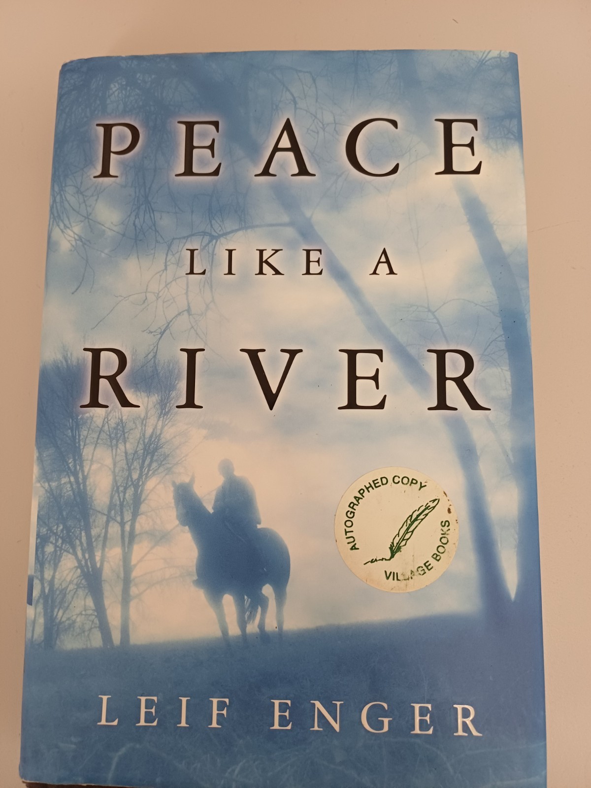 Autographed hardback first edition of Peace Like a River