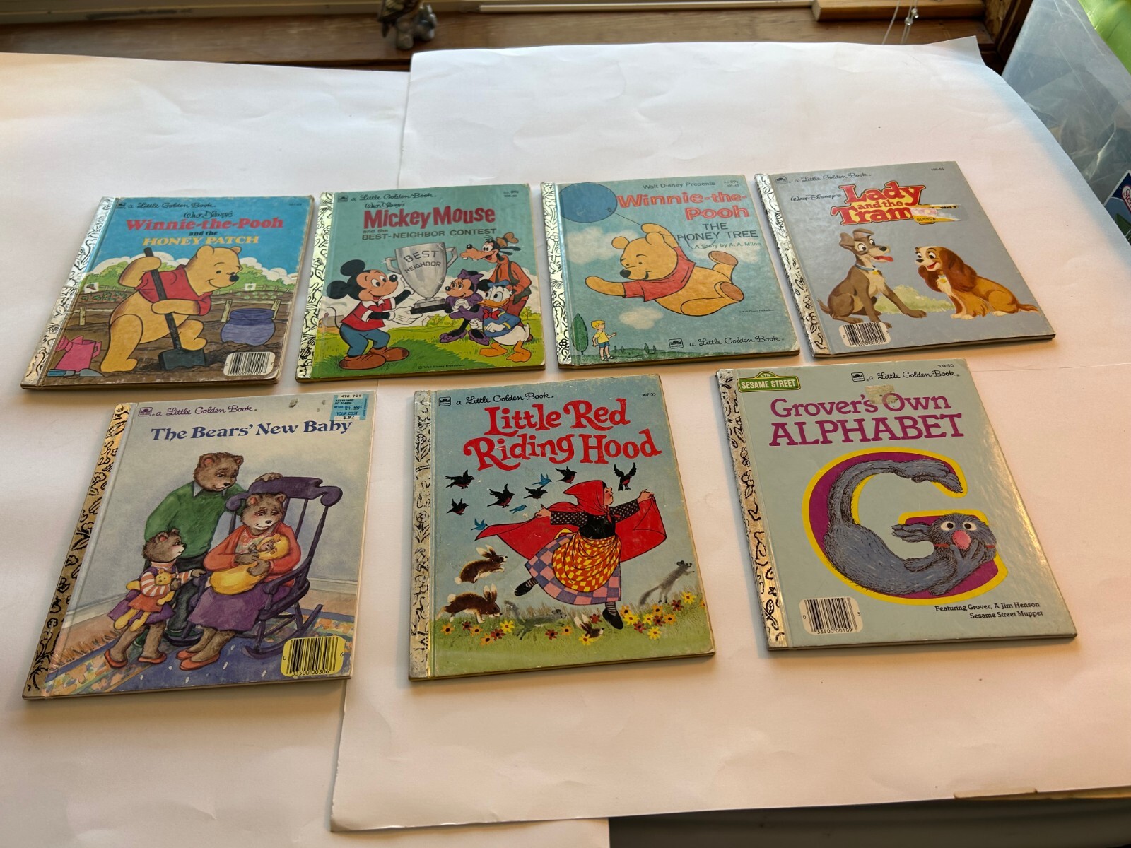 Little Golden Books Lot of 7- Mickey, Winnie, Little Red, Bears,Grover,Lady & Tr
