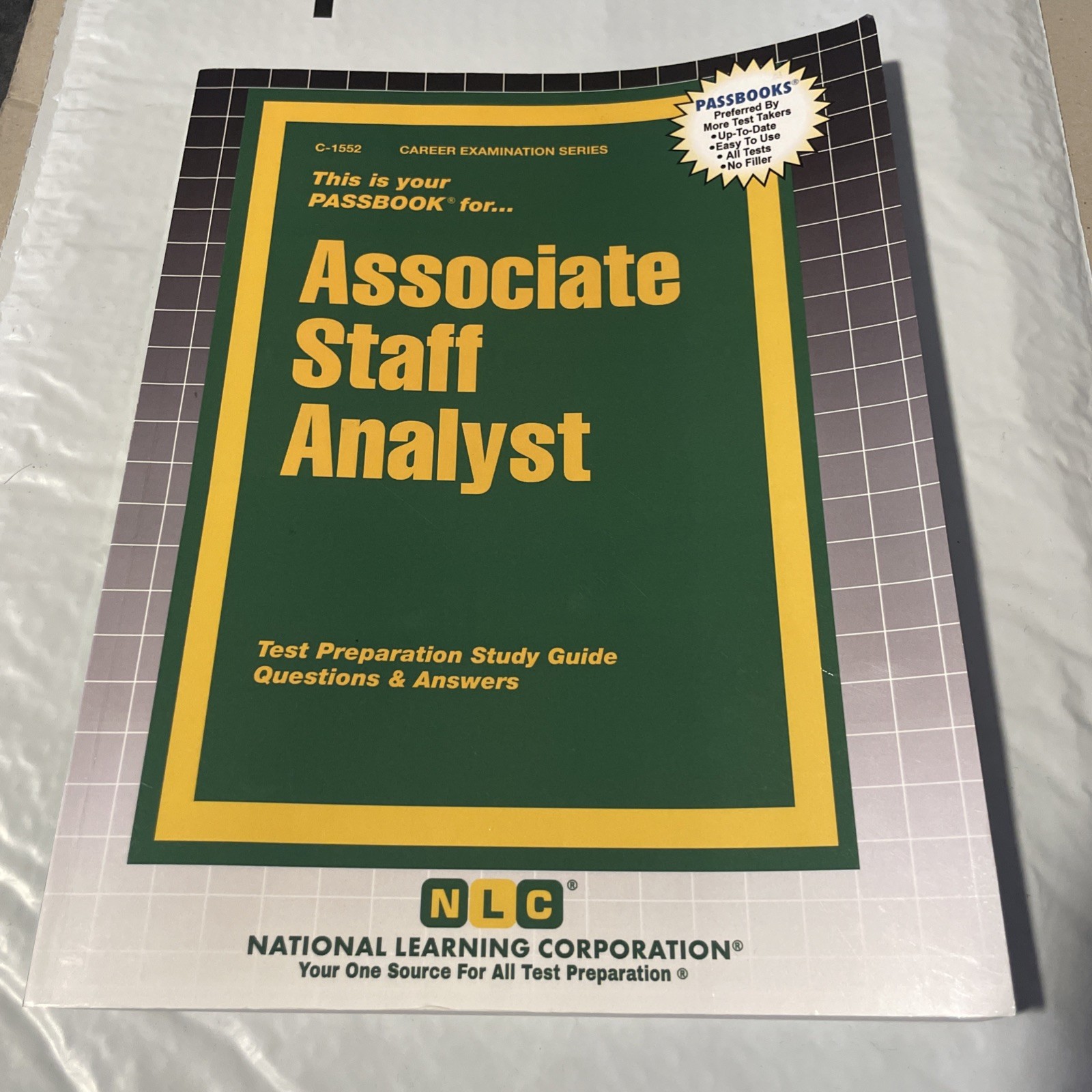 Associate Staff Analyst by Passbooks Paperback Book