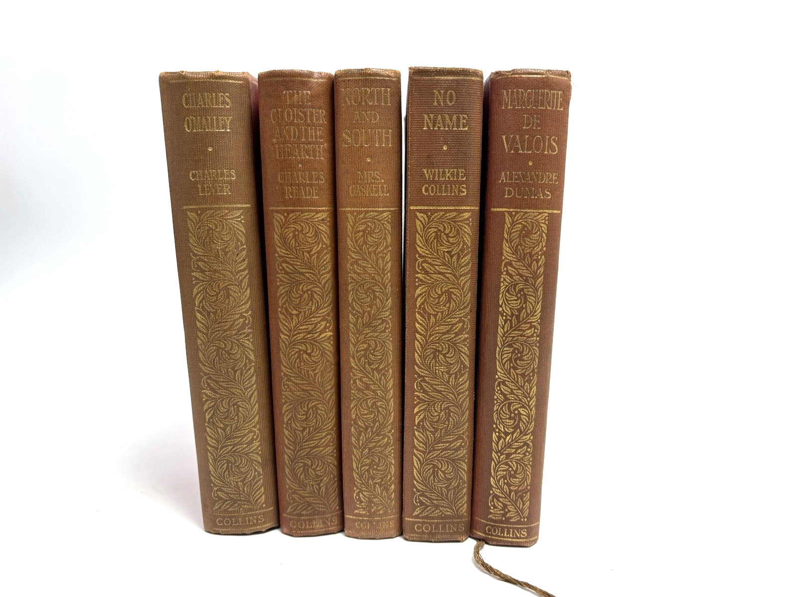 Collection of Small Old Books for Decoration. 12cm shelf space. 15.5cm Tall