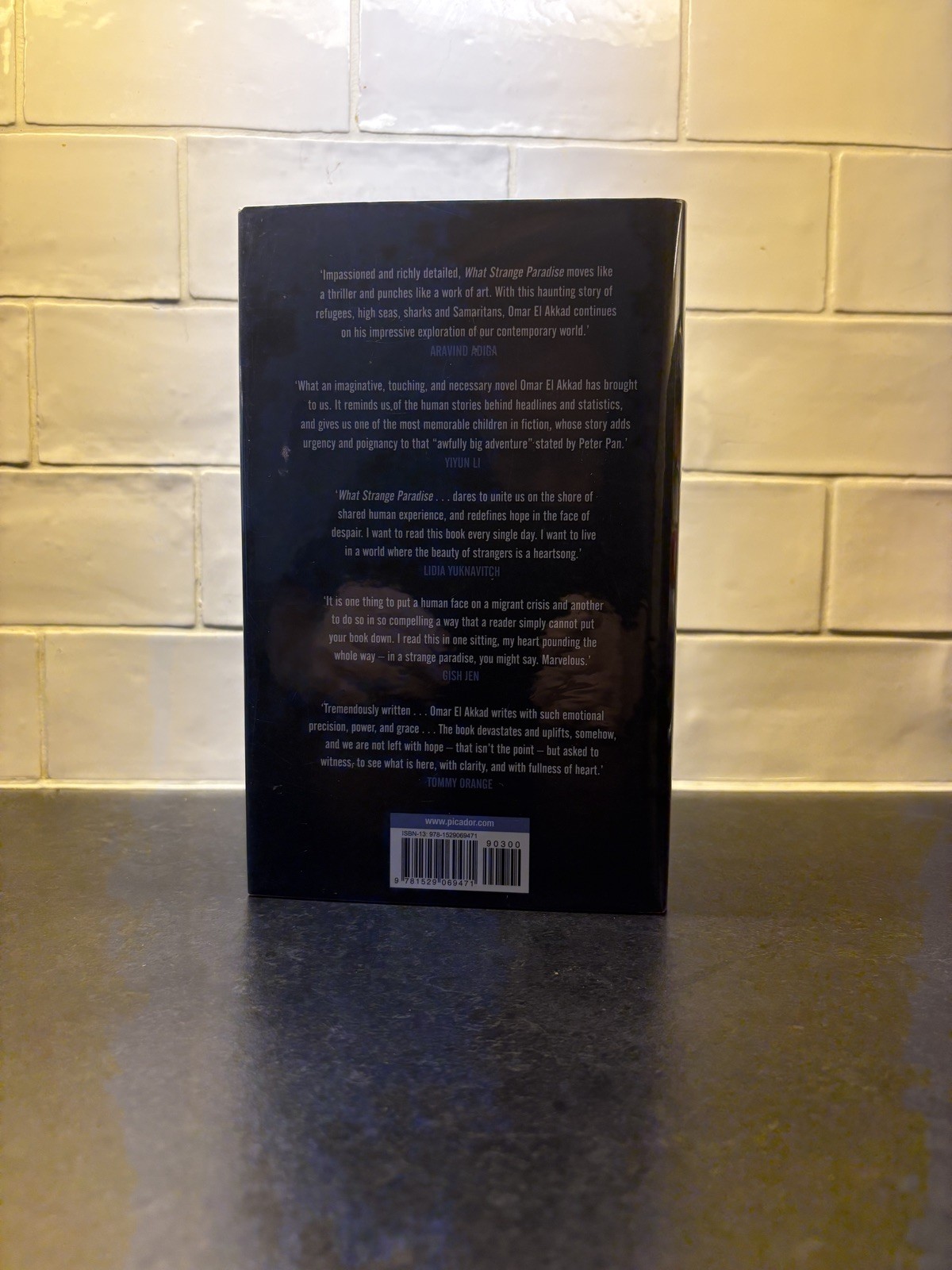 What Strange Paradise by Omar El Akkad-Goldsboro signed numbered first edition