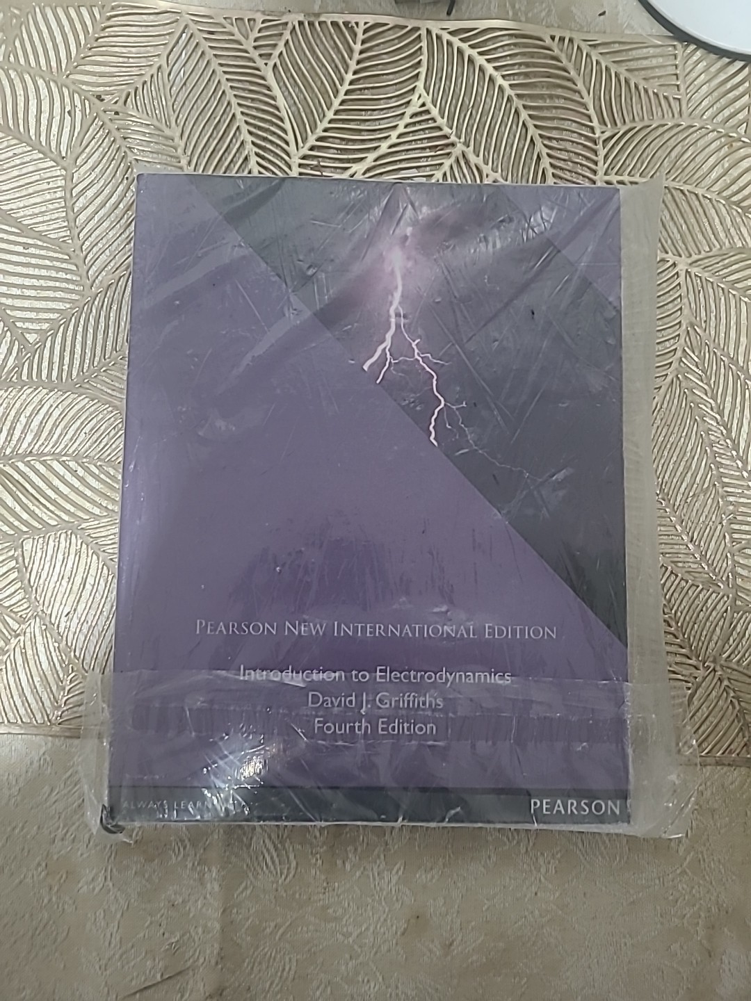 INTRODUCTION TO ELECTRODYNAMICS: PEARSON NEW INTERNATIONAL By David J. Griffiths
