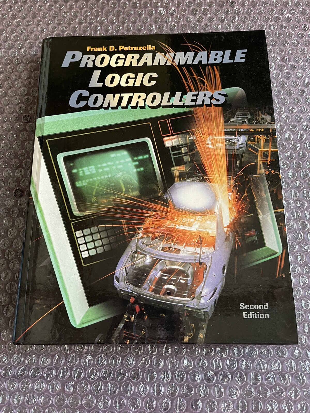 Programmable Logic Controllers by Petruzella, Frank D.; Petruzella 2nd Edition
