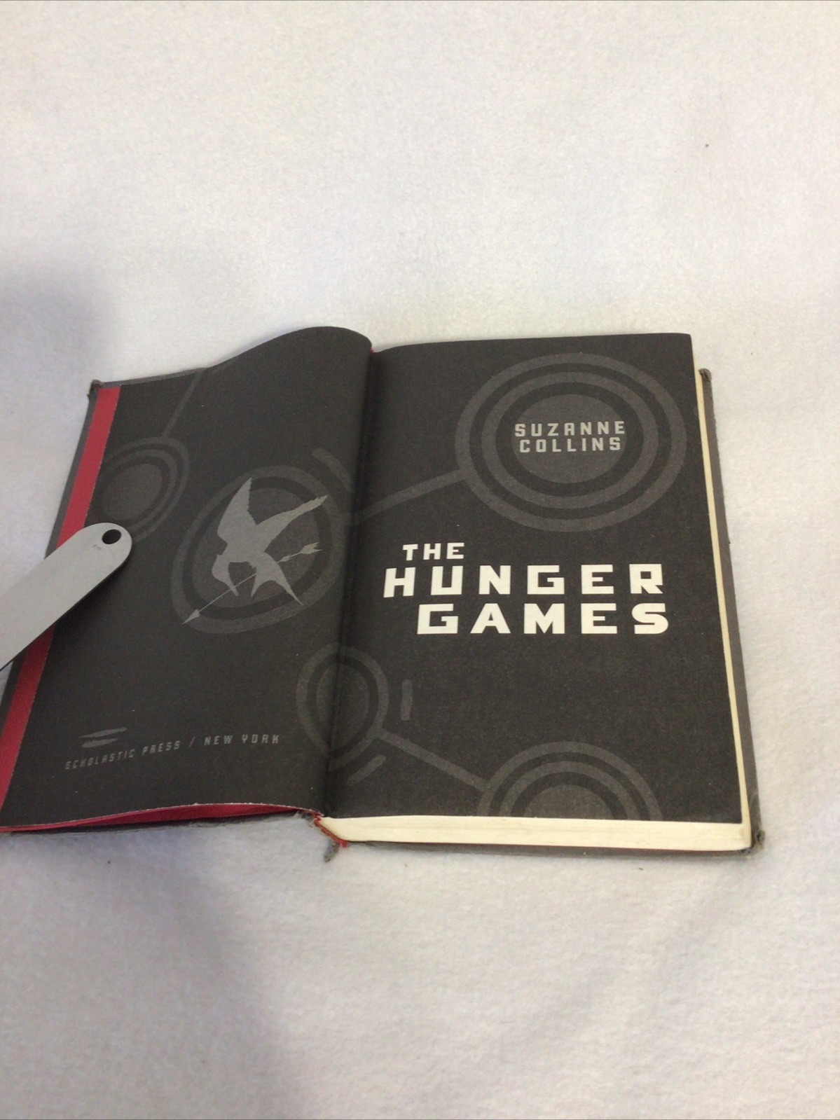Scholastic The Hunger Games Suzanne Collins First Edition Hardcover Grey Good