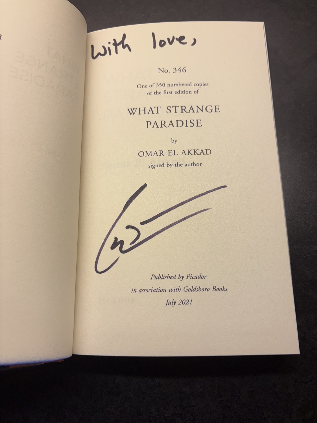 What Strange Paradise by Omar El Akkad-Goldsboro signed numbered first edition