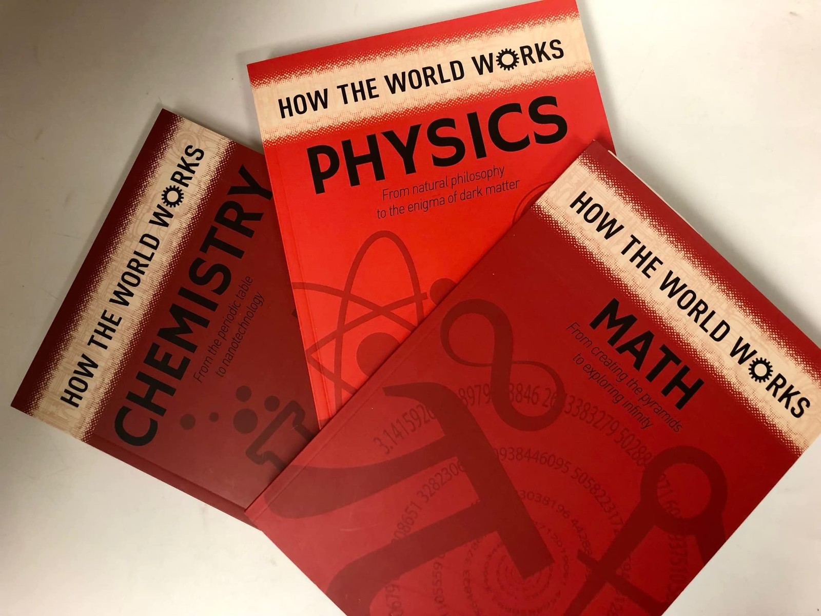 How the World Works: the Science Collection. Math, Physics, Chemistry 3 volu…