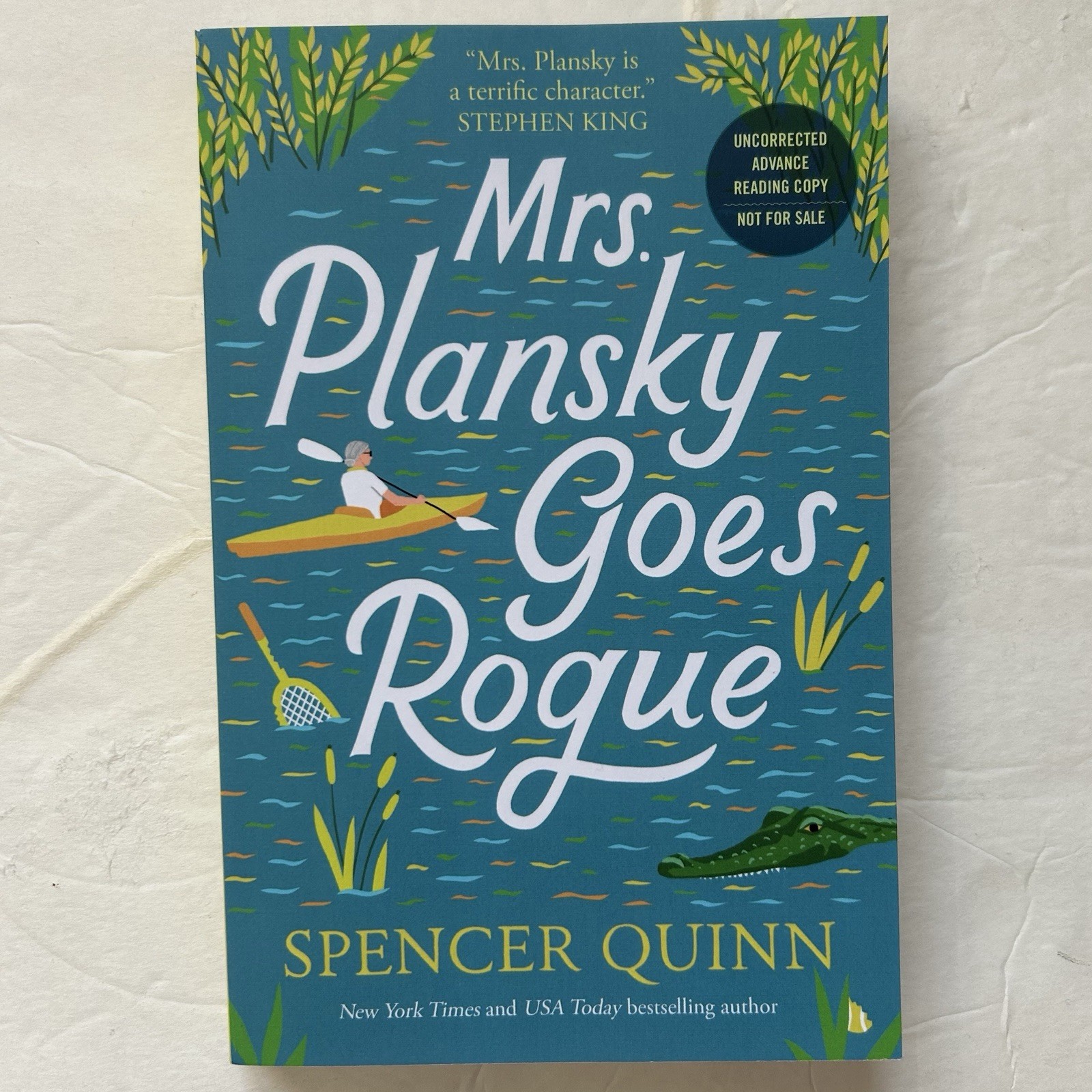 Mrs. Plansky Goes Rogue (#2), by Spencer Quinn, Advance Reader’s Copy, Softback.