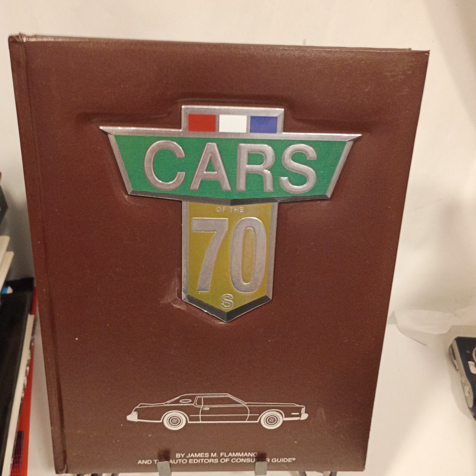 Cars of the 70s James M Flammang Consumer Guide Brown Hardcover 1970s Auto