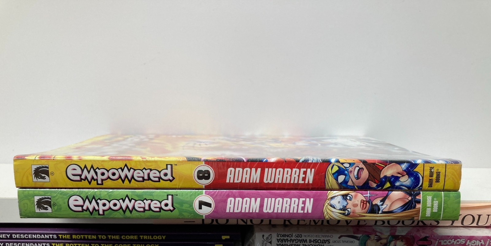 Empowered Vol.7,8(2 Books) Paperback – December 31, 2013 by Adam Warren (Author