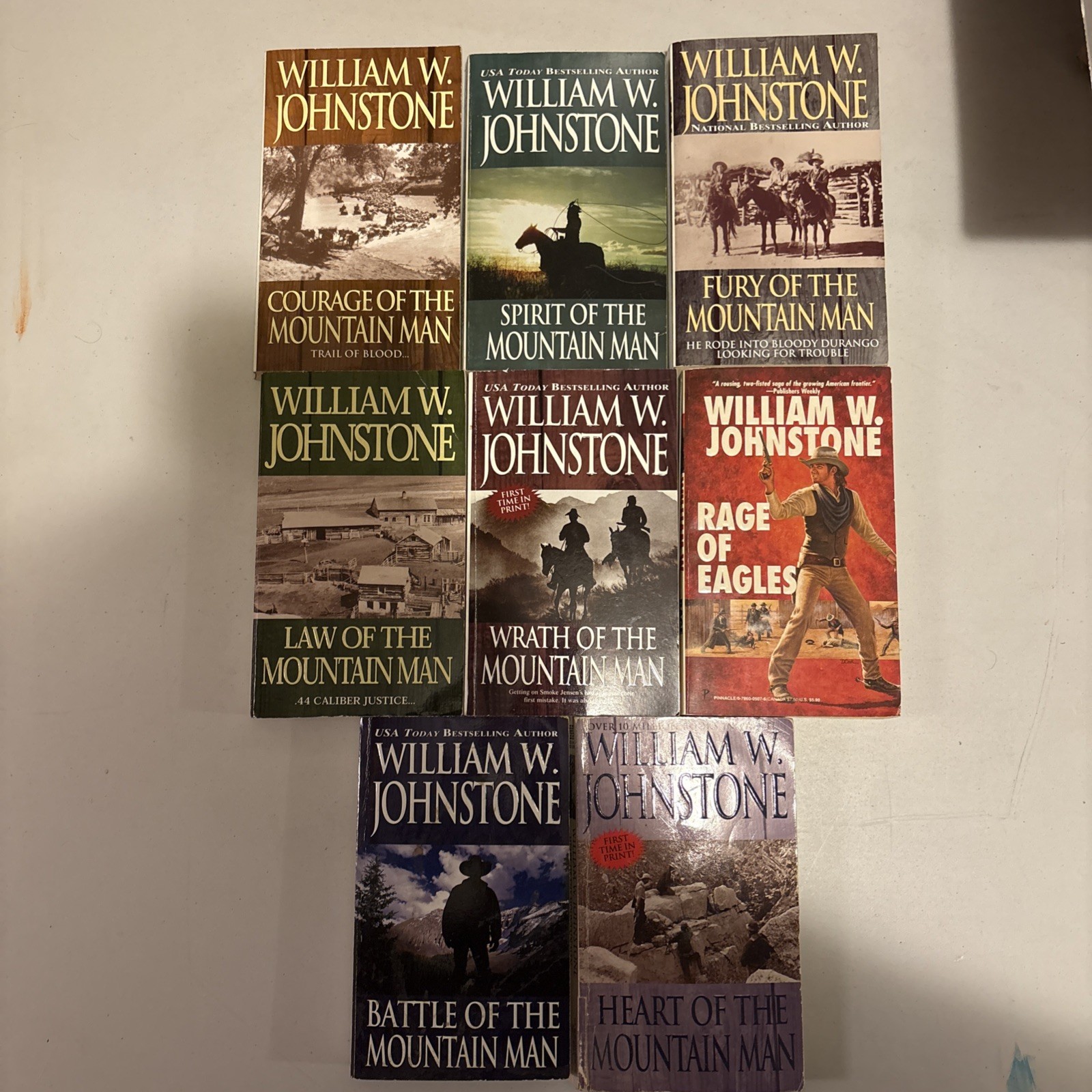 Lot of 8 William W. Johnstone Western Paperbacks – Ex‑Library – Action Series