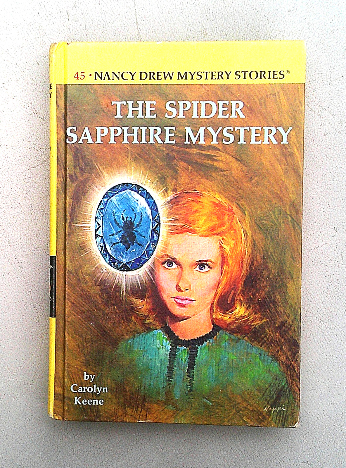 Nacy Drew #45 HC, “The Spider Sapphire Mystery” Black & White End pages. UNREAD.