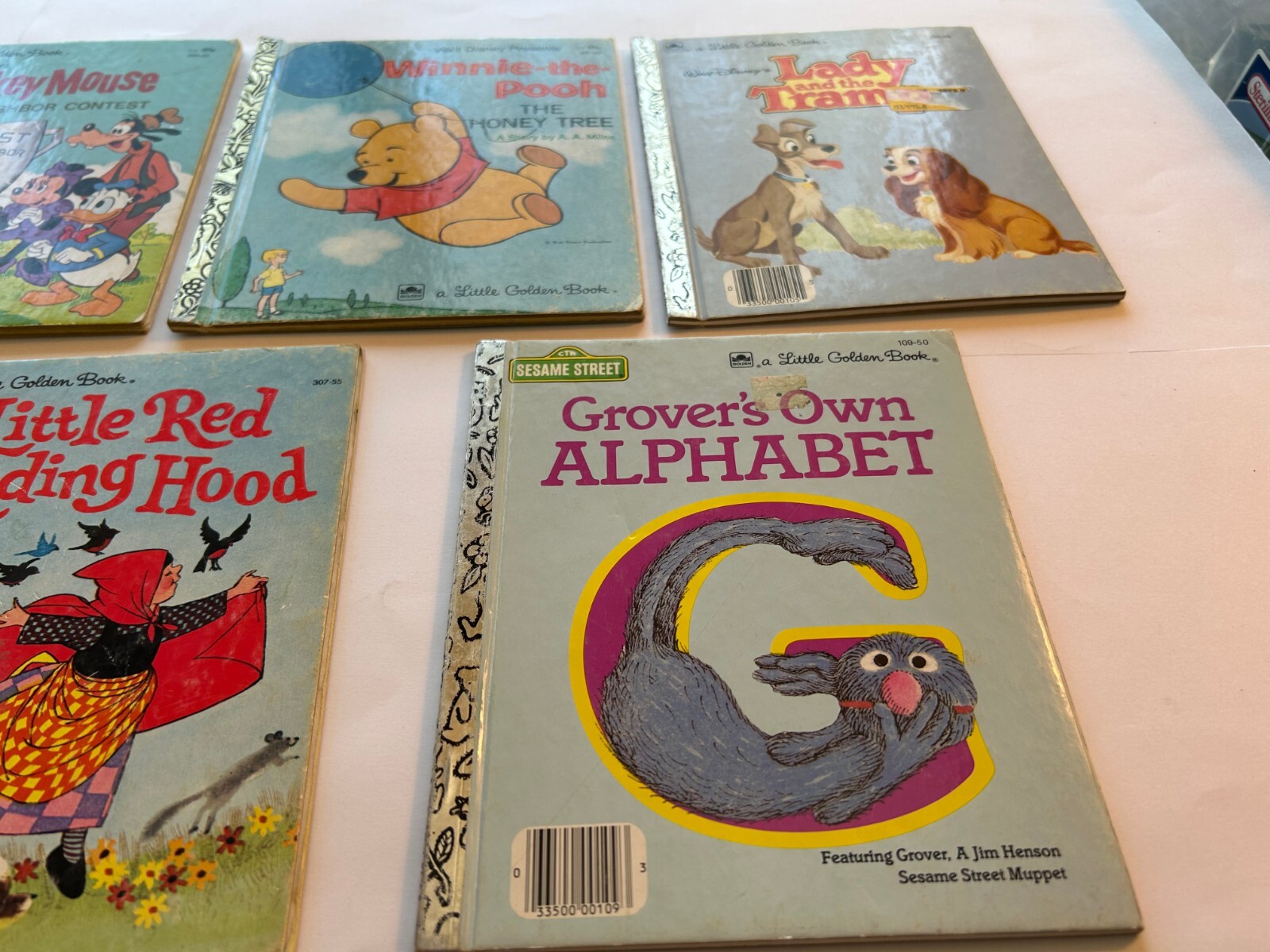 Little Golden Books Lot of 7- Mickey, Winnie, Little Red, Bears,Grover,Lady & Tr