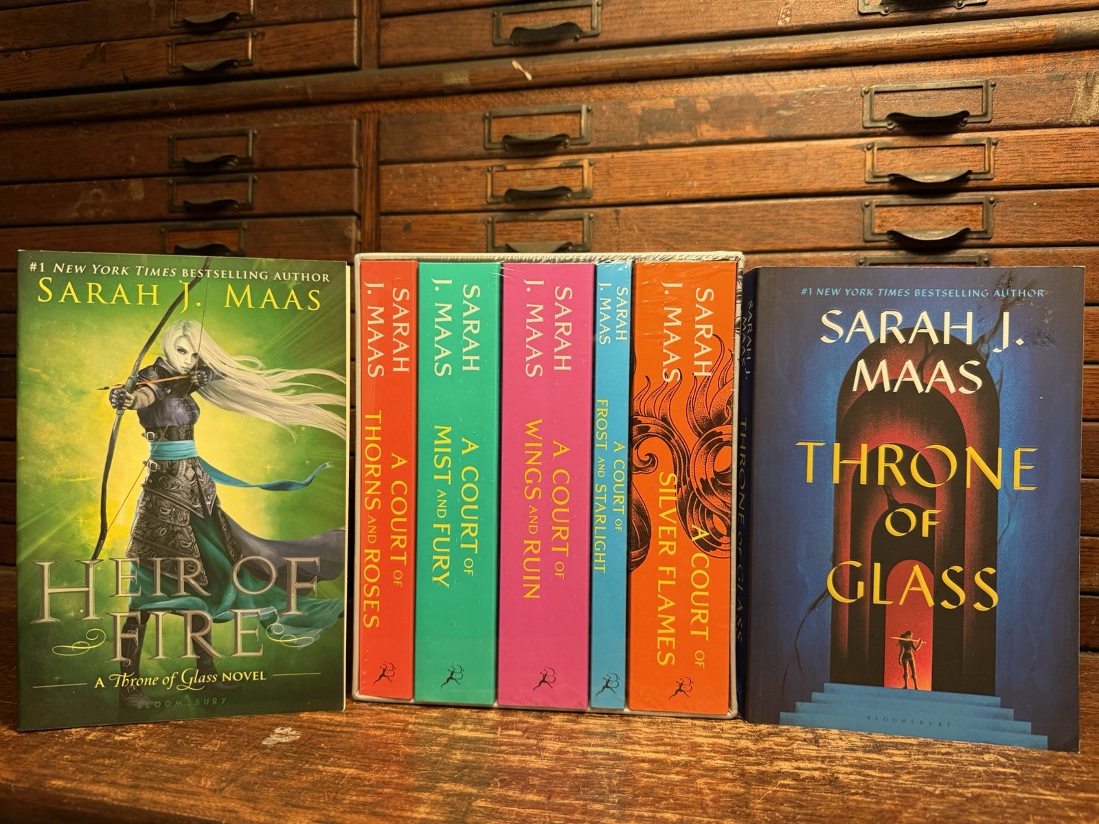 Lot 7 Sarah J. Maas Books: Sealed Court Thorns Roses Box Set + Heir Fire, Glass