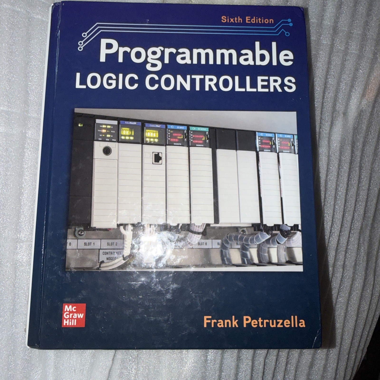 Programmable Logic Controllers by Frank Petruzella