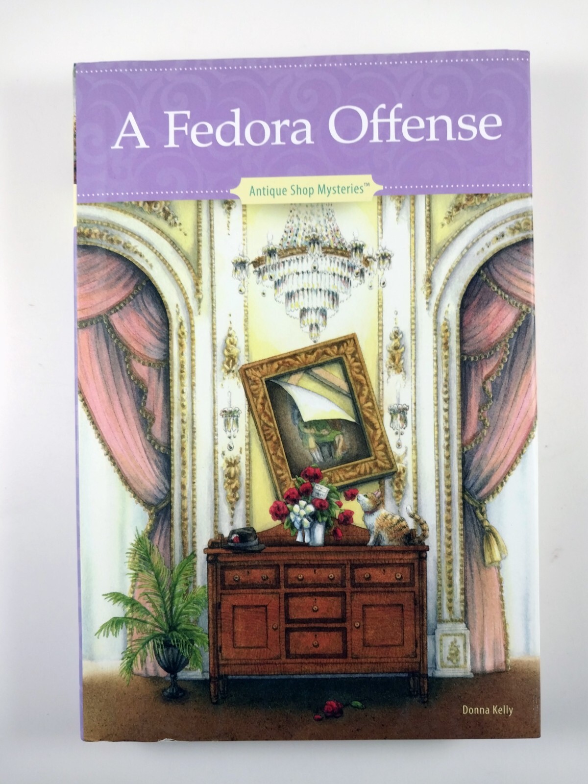 A Fedora Offense by Donna Kelly (2017, HC) Antique Shop Mysteries #14