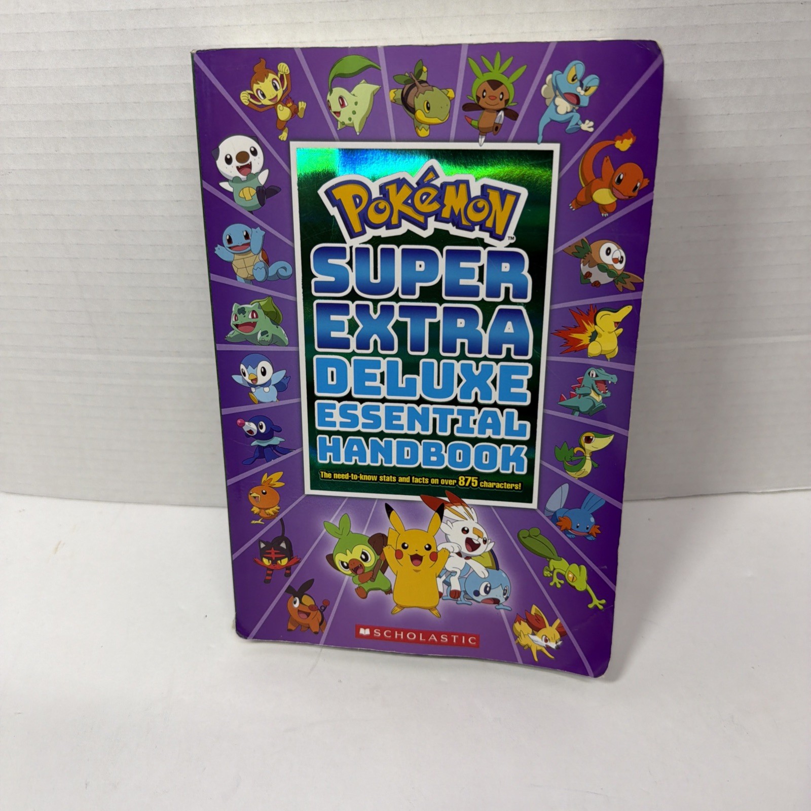 Super Extra Deluxe Essential Handbook: the Need-To-Know Stats and Facts