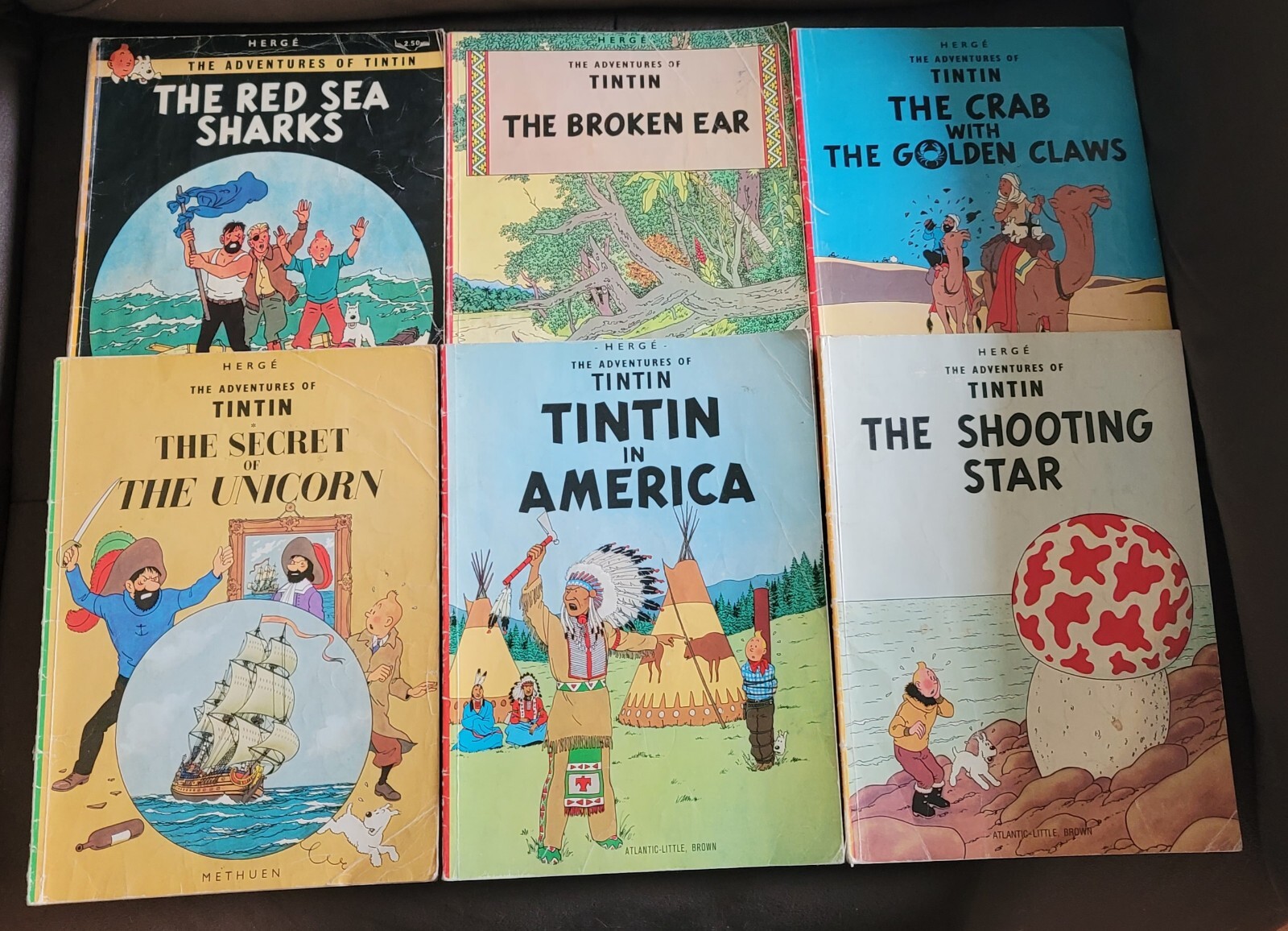 Lot Of 7 Herge The Adventures Of TinTin Star Ear Sharks Claws Unicorn America